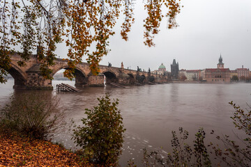 Fog over the Vltava river near Charles Bridge