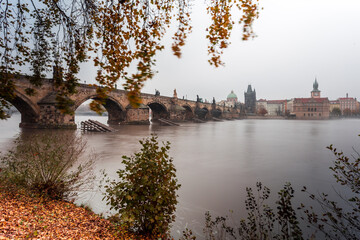 Fog over the Vltava river near Charles Bridge