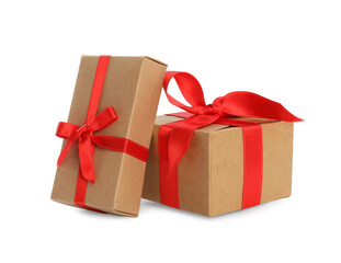 Christmas gift boxes decorated with red bows on white background