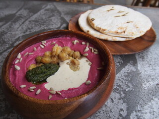 Hummus Gargirim, hummus plate served with chickpeas, tahini and olive oil, This food is a traditional Middle Eastern dish, El Nido, Palawan, Philippines