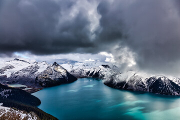 Beautiful landscape view of Garibaldi Lake vibrant cloudy fall season day. Taken from top of Panorama Ridge, located near Whister and Squamish, North of Vancouver, BC, Canada.