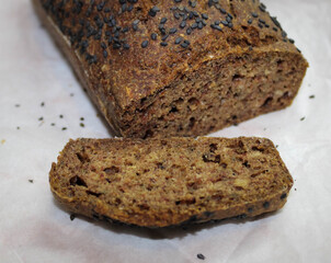 Buckwheat organic  bread with black sesame on white background