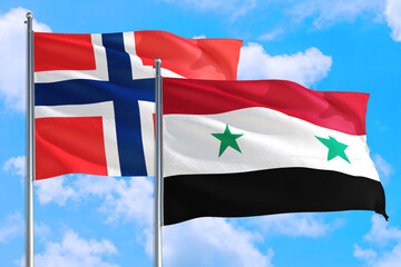 Syria and Bouvet Islands national flag waving in the windy deep blue sky. Diplomacy and...