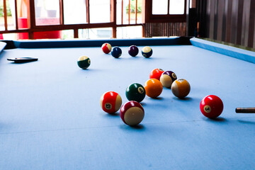 Snooker balls on the snooker table.