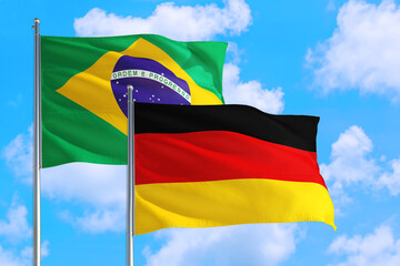 Ghana and Brazil national flag waving in the windy deep blue sky. Diplomacy and international relations concept.