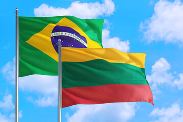 Luxembourg and Brazil national flag waving in the windy deep blue sky. Diplomacy and international relations concept.