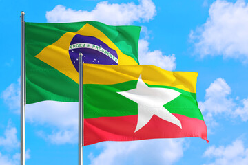 Namibia and Brazil national flag waving in the windy deep blue sky. Diplomacy and international relations concept.