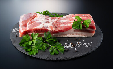 Pork belly on a black stone tray