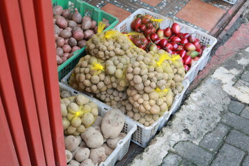 Fresh organic potato background in the market.
