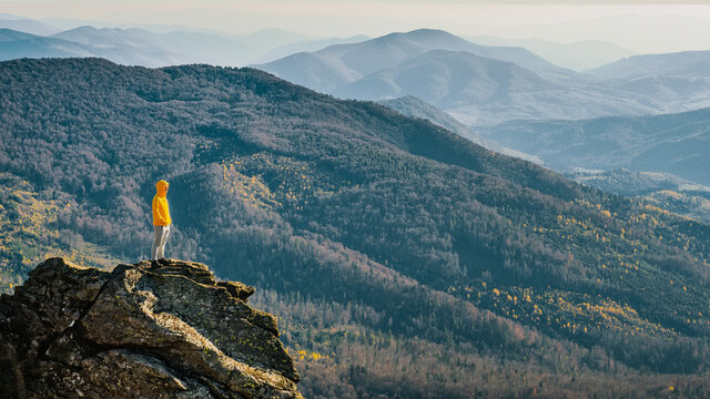 A man standing on top of a mountain Pikui, Ukraine.