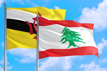 Lebanon and Brunei national flag waving in the windy deep blue sky. Diplomacy and international relations concept.
