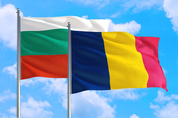 Chad and Bulgaria national flag waving in the windy deep blue sky. Diplomacy and international relations concept.