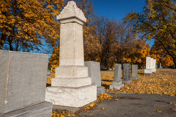 Fototapeta na wymiar Obelisk Monument Headstone in Cemetery