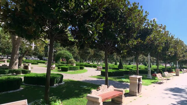 Footage of park called "Goztepe Parki" by famous shopping avenue called "Bagdat" located in Kadikoy district on Asian side of Istanbul. It is a sunny summer day.