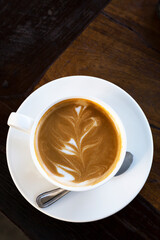 Hot coffee on table top view