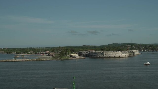 View from ship entering Cartagena port and footage of old fort 