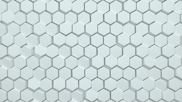 Abstract hexagonal background. A large number of white hexagons. 3d wall texture, hexagonal blocks clusters. Cellular panel. Seamless loop 3d animation of 4K