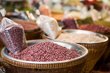Selective focus of Red beans and grains in the basket  for sale