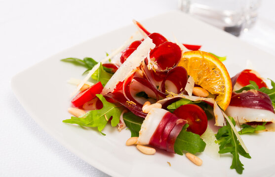 Tasty Magret de canard seche salad. High quality photo