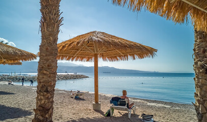 Sandy beach with umbrellas, Red Sea, Middle East