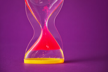 Hourglass on color background. Time management concept