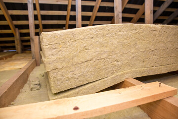 Insulation of the ceiling with fiberglass. Roof insulation. Laying and insulation with stone wool...