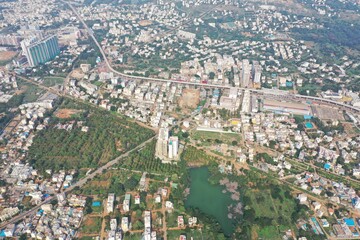 Fototapeta na wymiar Aerial lake view of the buildings in the center of Bangalore city 