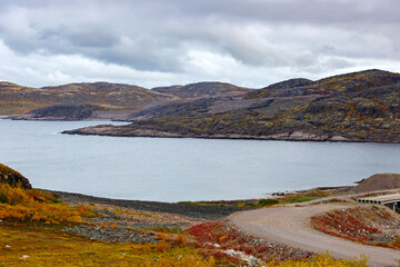 Fototapeta premium Bay on the Barents Sea coast in autumn. Kola Peninsula, Russia.