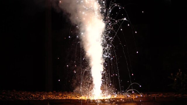 Closeup shot of the flower pot firecracker burning during the Diwali festival in India. Diwali celebration