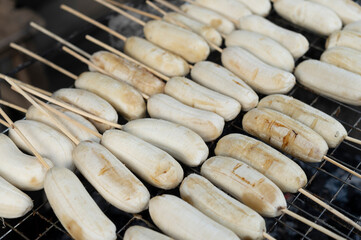 Roast banana on a stove with fired