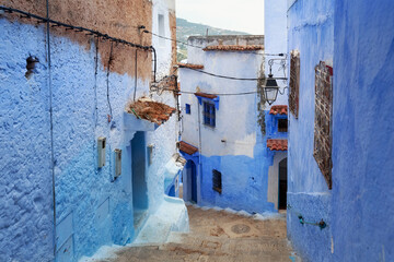 View of the blue walls of Medina quarter in Chefchaouen, Morocco. The city, also known as Chaouen is noted for its buildings in shades of blue and that makes Chefchaouen very attractive to visitors.