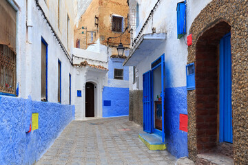View of the walls of Medina quarter in Chefchaouen, Morocco. The city, also known as Chaouen is noted for its buildings in shades of blue and that makes Chefchaouen very attractive to visitors.