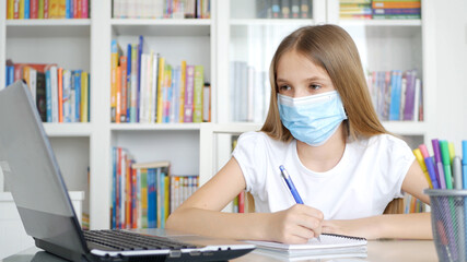 Kid Using Laptop Studying, Child Learning, Writing at Home, Schoolgirl in Coronavirus Pandemic, Homeschooling, Online Education