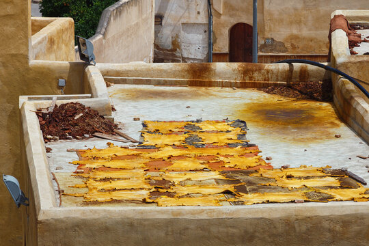 The leathers are dried on the roofs of the old tannery buildings in Fez. Morocco. The tanning industry in the city is considered one of the main tourist attractions.