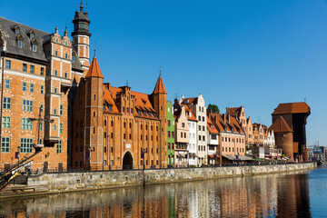 Naklejka premium Embankment of Motlawa river in Gdansk in sunny spring day, Poland.