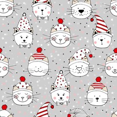 Seamless head nice kittens with hats on stars background. Pattern for Merry Christmas. Print for fabric, wrapping paper and children's accessories.