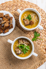 Traditional French onion soup with toasted bread croutons