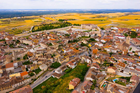 Scenic view from drone of Cuellar cityscape with medieval Castle of Dukes of Alburquerque, Spain