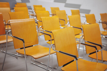 Fototapeta premium Row of yellow chairs
