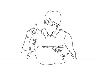 man paints a brush stroke on a transparent wall and holds a palette in front of him, the artist is wearing a mask. one line drawing transparent creativity concept, traditional art