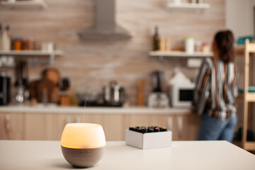Essential oils diffuser distributing aromatherapy. Aroma health essence, welness aromatherapy home spa fragrance tranquil theraphy, therapeutic steam, mental health treatment