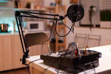 Microphone and mixer for podcast of famous influencer. Recording social media content with production microphone. Digital web internet streaming station