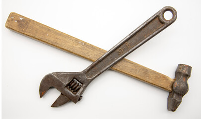 Set of old hand tools, hammer, wrench on a white background.