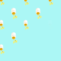 pill bottle repeated on blue background