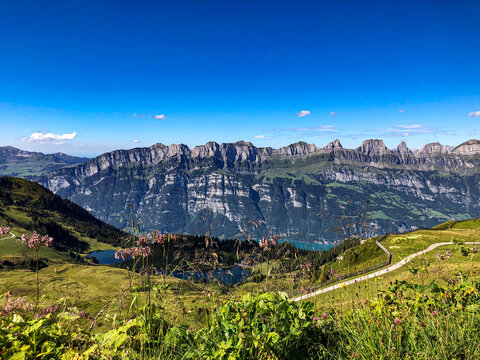 Beautiful mountain chain Panoroma in Flums Switzerland on a sunny day with Leistchamm and Brisi - Drone Perspective Landscape Photography