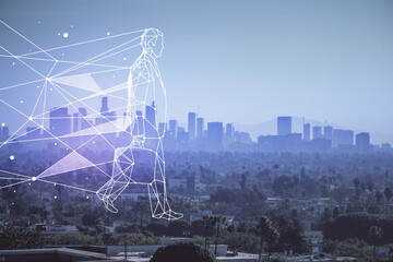 Double exposure of start up theme drawings over cityscape background. Concept of success.