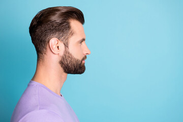 Profile side photo of young handsome man confident smart look empty space isolated over blue color...