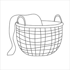 Line art decorative wicker basket with a blanket. Modern hand drawn outline illustration decoration for home interior, hygge scandinavian style, trendy drawing. creative design. isolated on white
