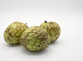 Three custard apple, Annona squamosa,  sweetsop,  isolated on white background