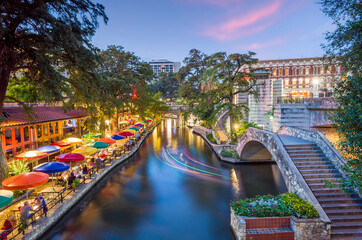River walk in San Antonio city downtown skyline cityscape of Texas USA - 391718976